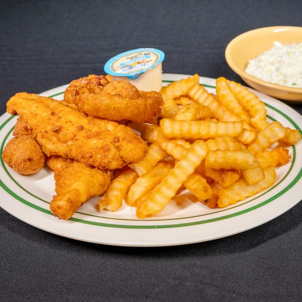 Fried chicken tenders, hush puppies, and crinkle-cut fries with dipping sauce and coleslaw.